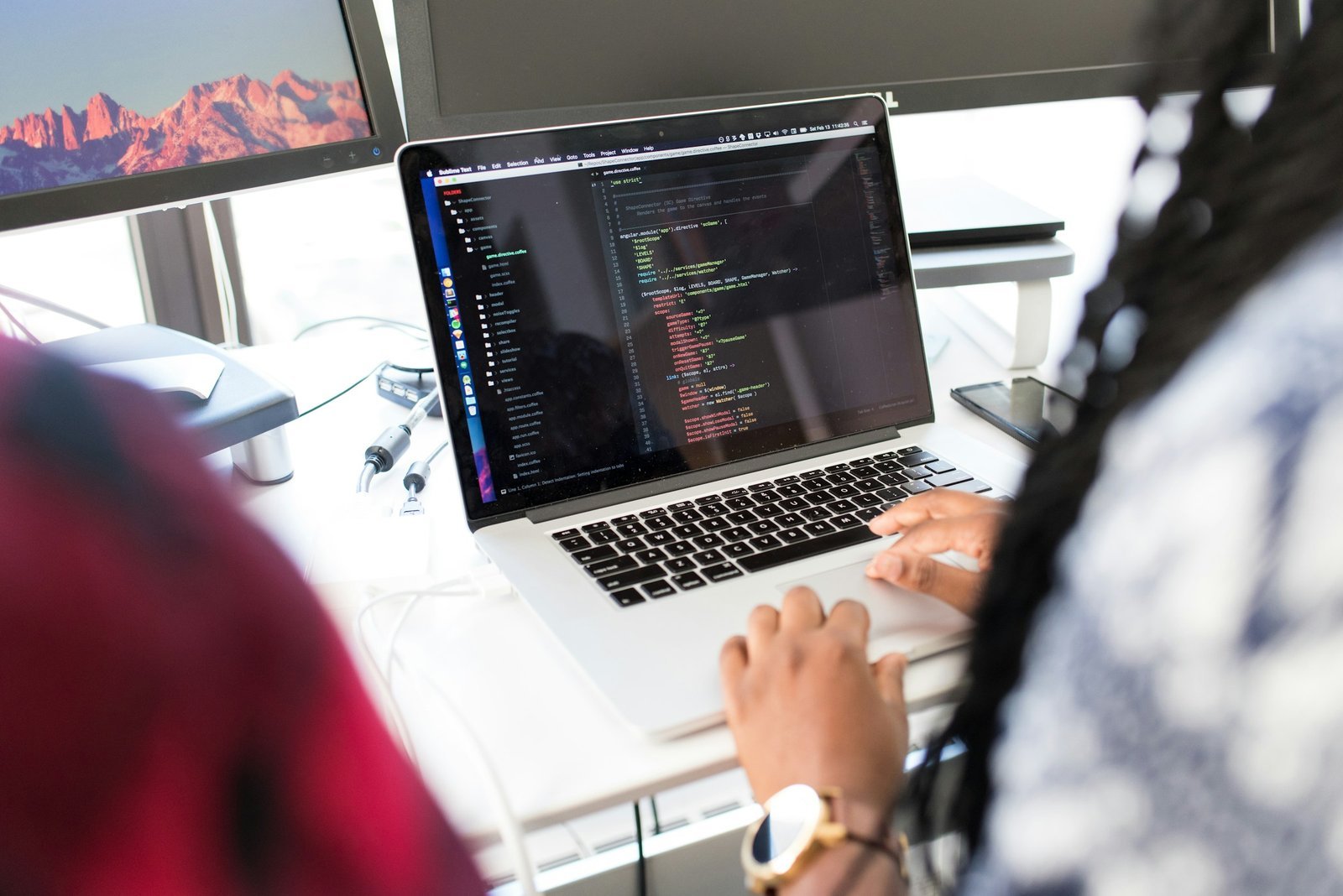 Logic Aspire engineers writing code